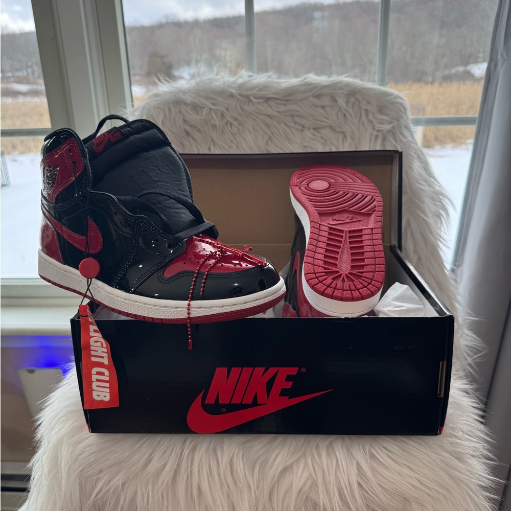 Jordan 1 Retro High OG ‘Patent Bred’
Black/White/Varsity Red